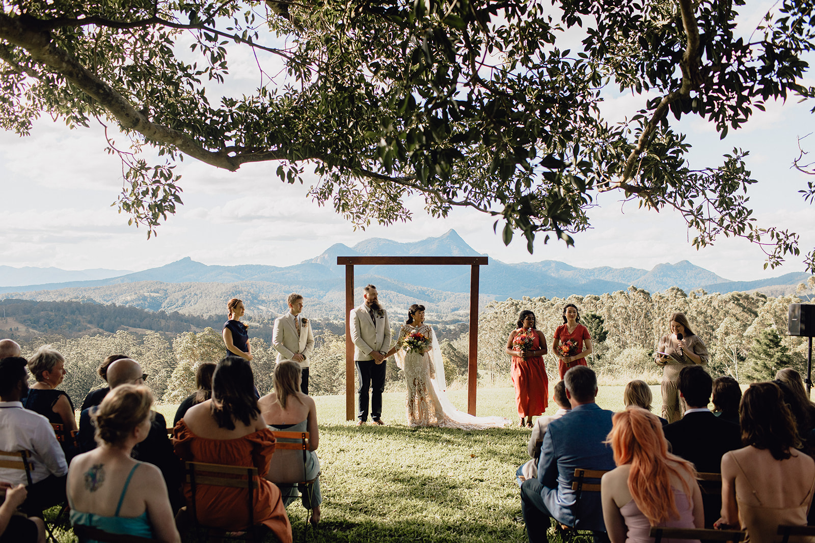 Outdoor wedding underneath the iconic Fig Tree at Midgibil Eco Resort, Tweed Hinterland NSW